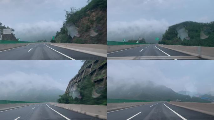 高速公路上云层翻滚奇景，云雾遮山视频