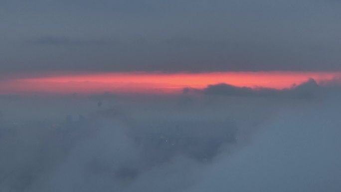 航拍西安高新CBD震撼日落晚霞穿云夜景