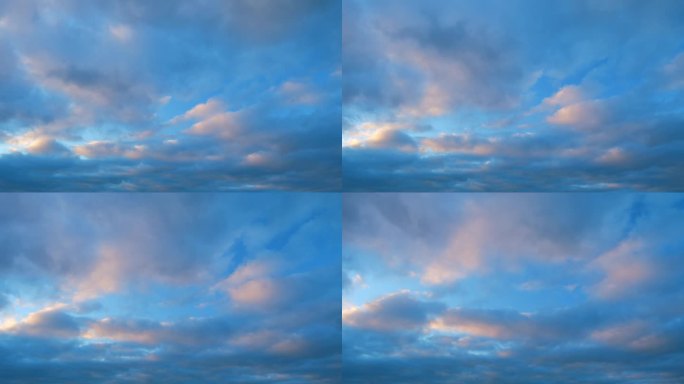 美丽的彩色云在夏天的天空。日落时五彩缤纷的天空。间隔拍摄。