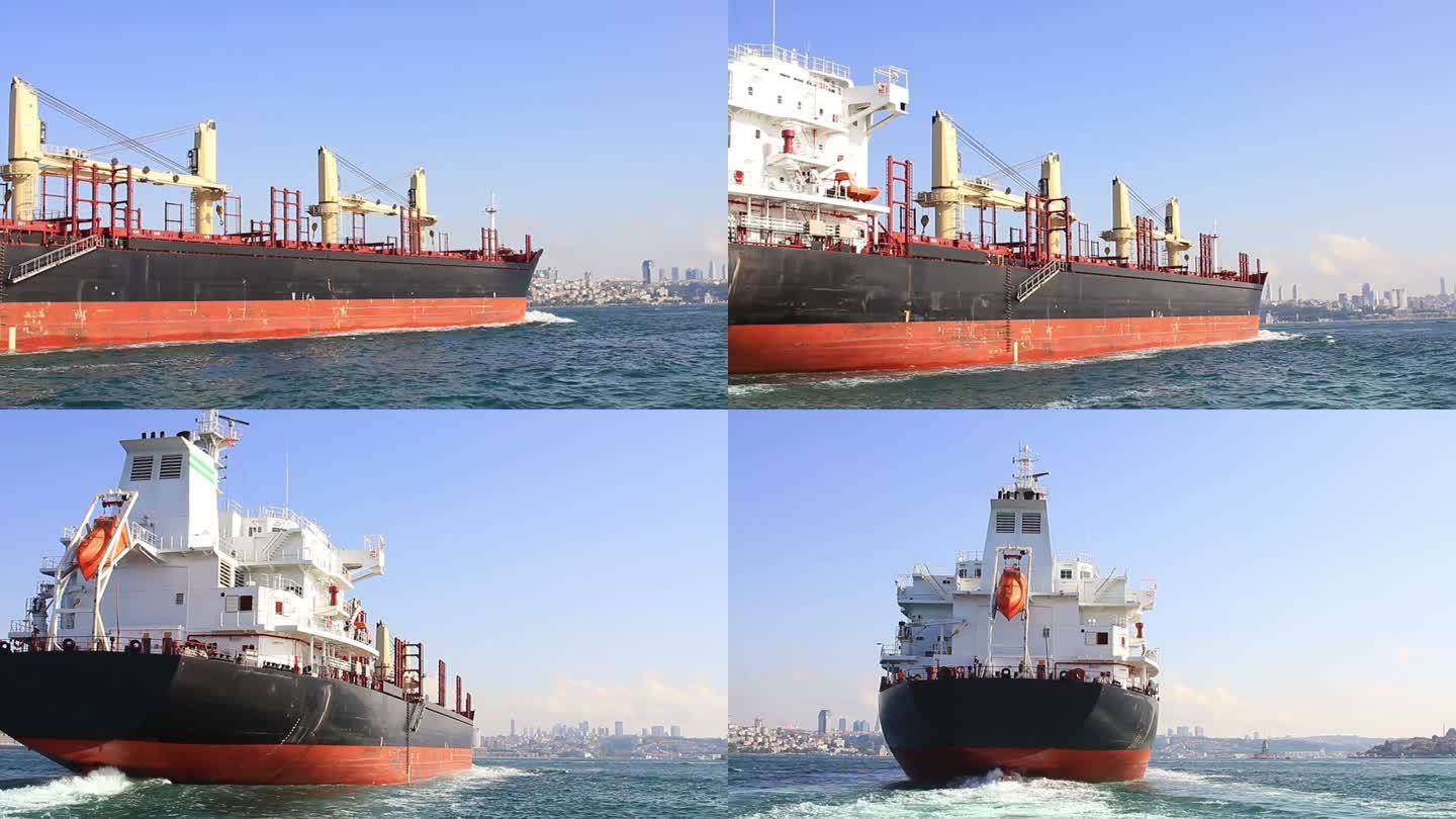 干货船。大型工业船的跟踪镜头。骑在沉重的运输船的尾迹上。