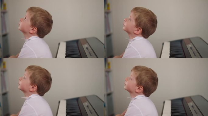 爱做梦的男孩坐在电子钢琴旁，不去上课