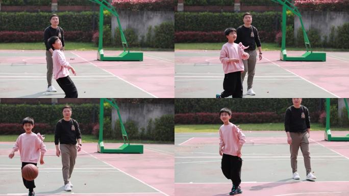 亚洲父亲和儿子在篮球场打篮球慢镜