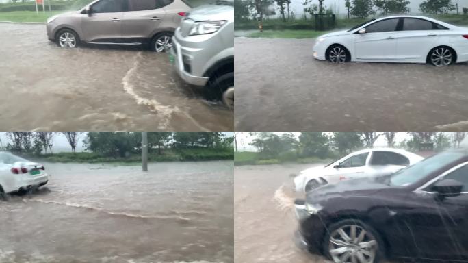 暴雨行驶挡风玻璃雨水下雨天行驶的汽车大雨