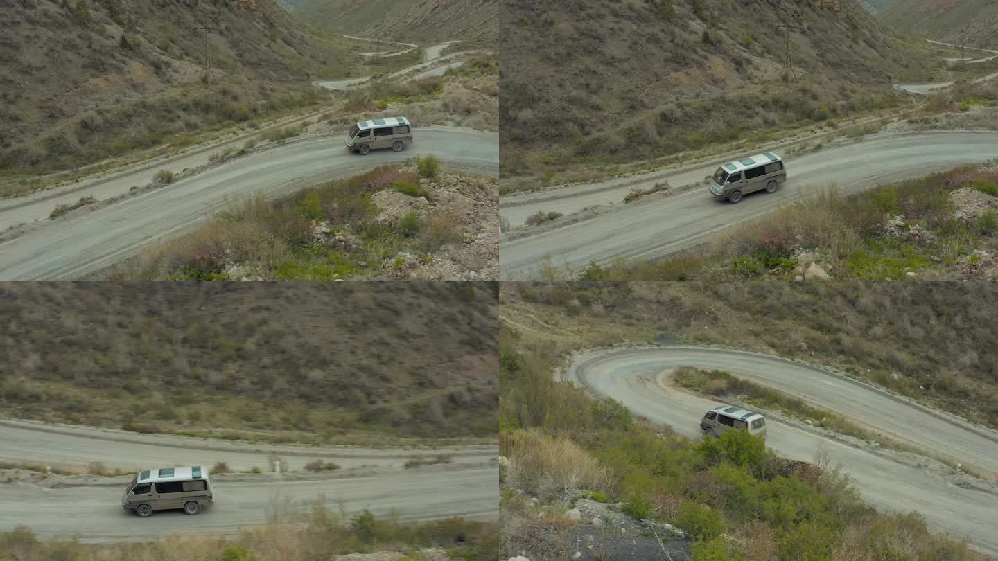 乘坐小巴在高地的公路旅行跟踪拍摄。中亚，吉尔吉斯斯坦。
