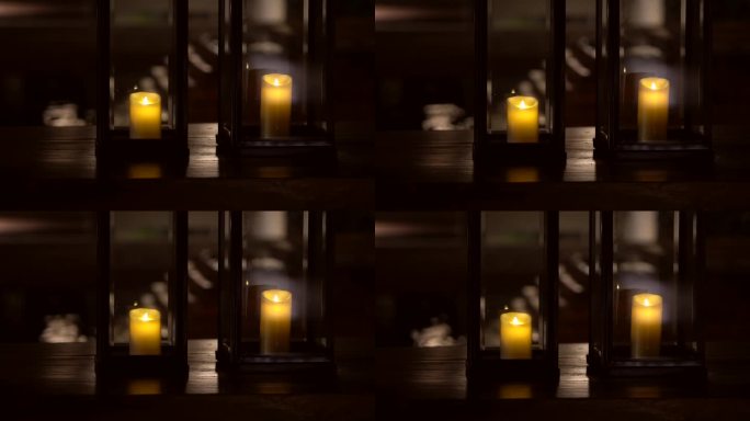 金属蜡烛和玻璃灯放置在房屋木甲板上，古典花园照明热带当代设计4k
