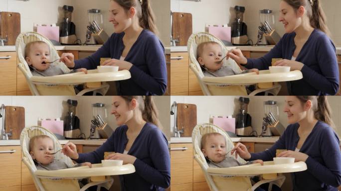 微笑的母亲用勺子喂她的儿子喝粥的画像。育儿理念，健康营养和婴儿护理