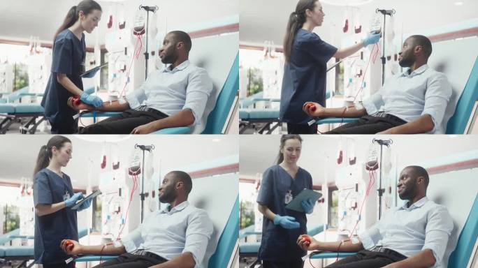 黑人商人在光明医院为需要的人献血。女护士带着平板电脑进来检查供体的进展和健康状况。捐赠给心脏手术患者