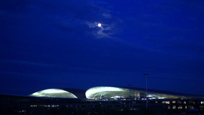 北京大兴机场航站楼夜景圆月当空 月升延时