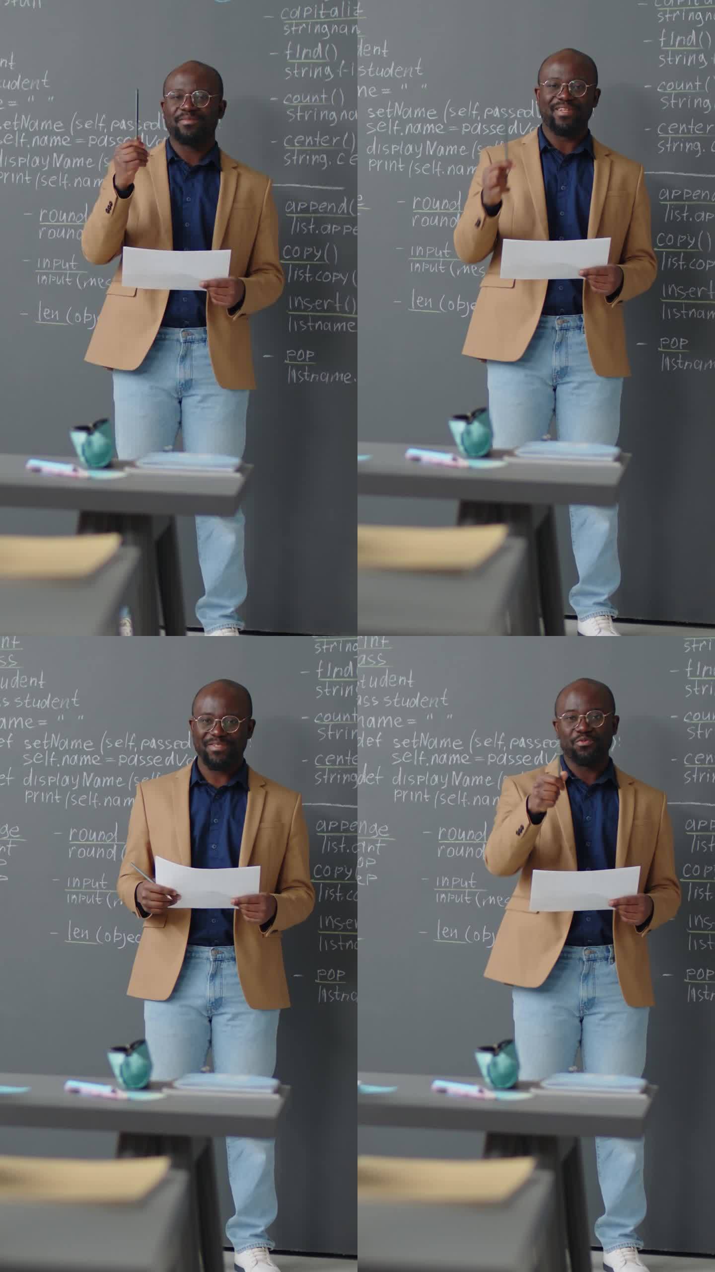 男老师站在黑板前竖版竖屏竖拍黑人