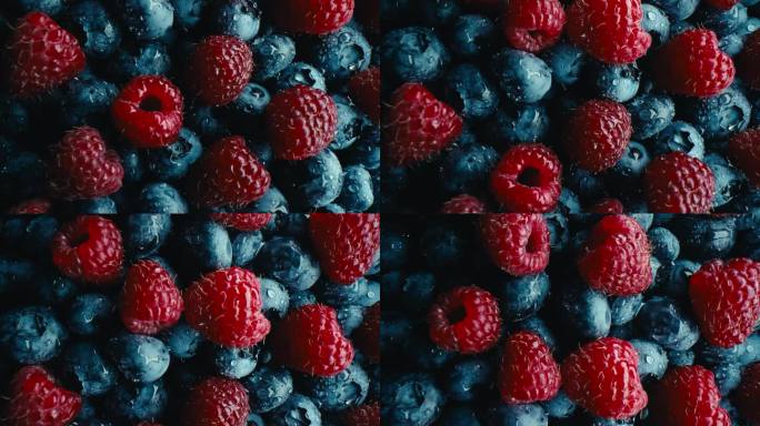 抽象的彩色浆果，极端的微距滑块。野生森林覆盆子，蓝莓