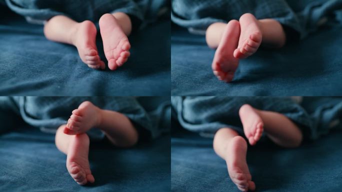 小，可爱和脚的婴儿在床上放松，可爱和青春。在家庭的卧室上平静、托儿所和新生儿的腿部特写，以供天真、纯