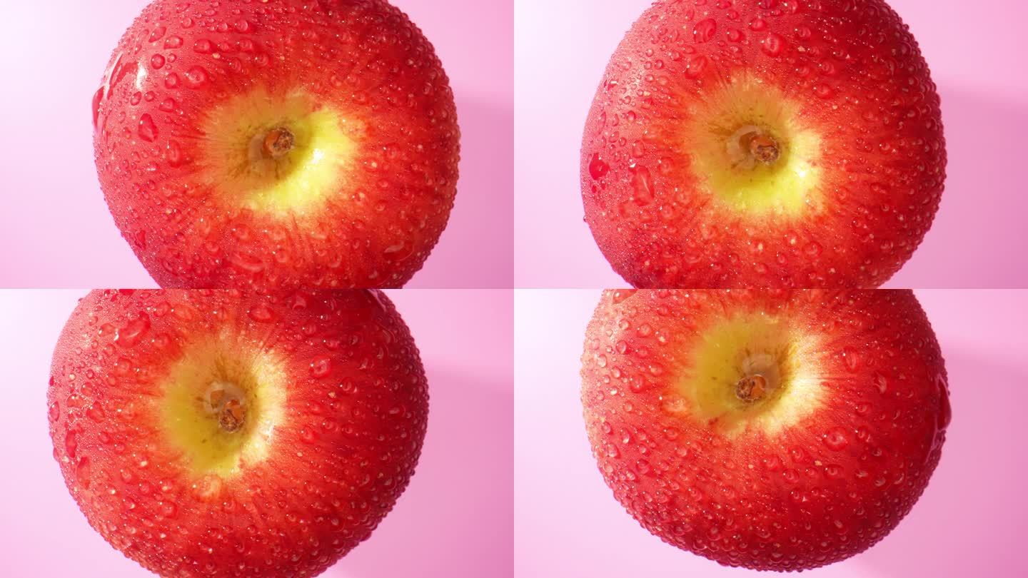 用探针镜头观察红苹果上的水滴