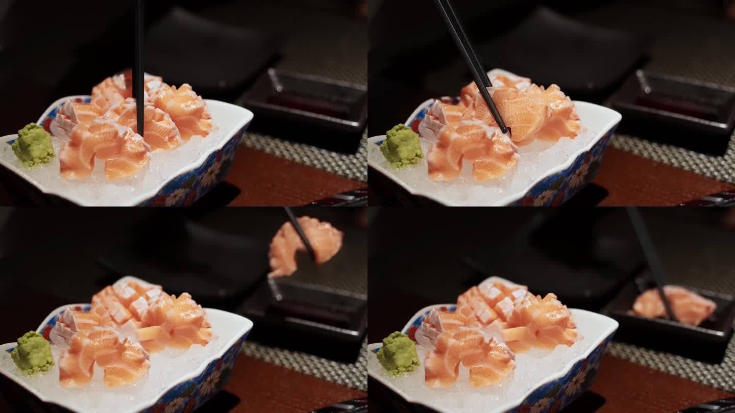 在日本料理店吃三文鱼腩刺身