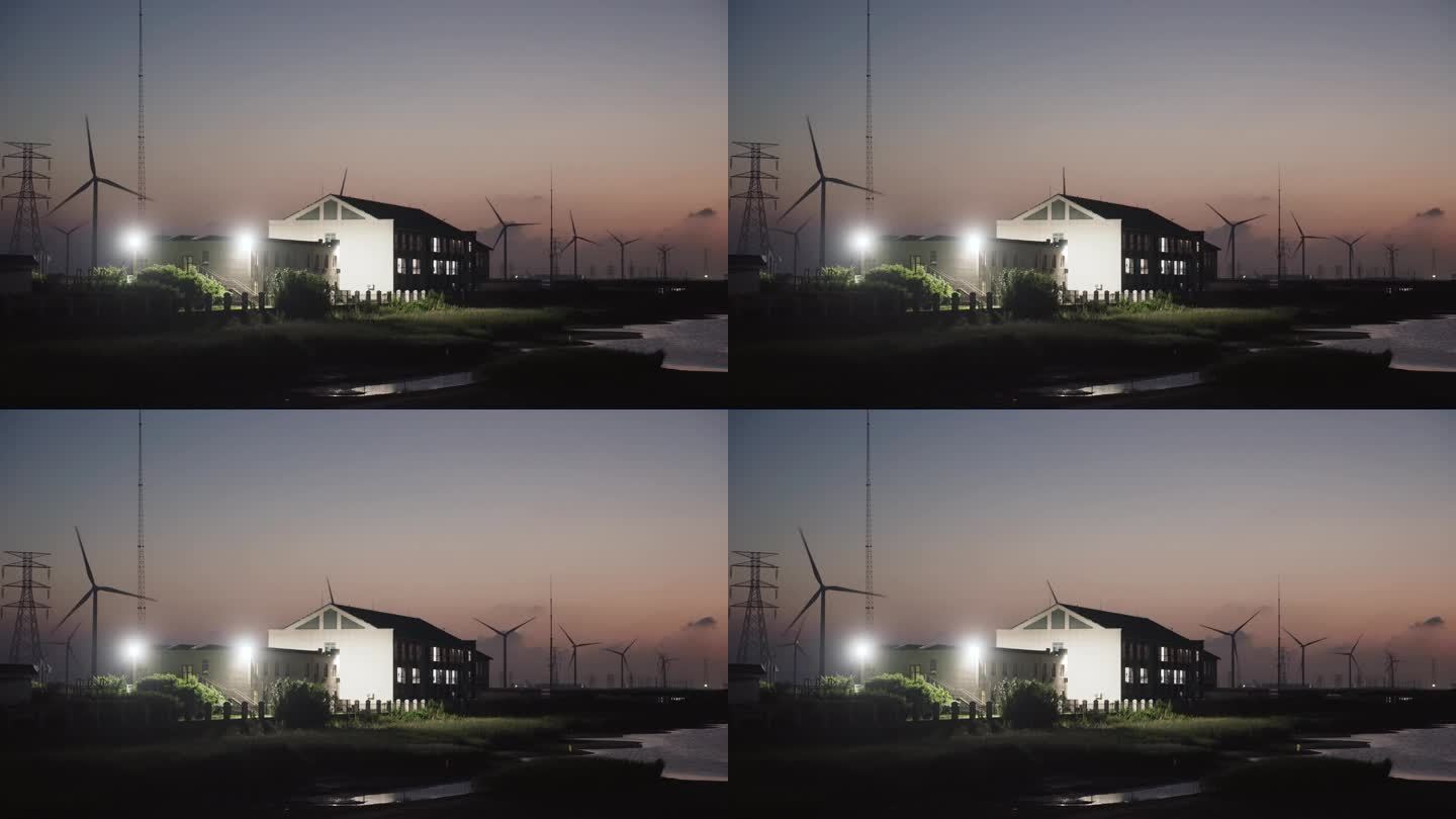 晚上河边的风力发电风车