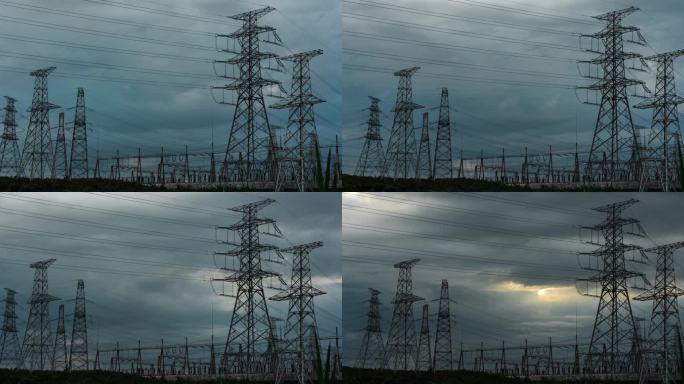 电力电塔和阳光穿过云层