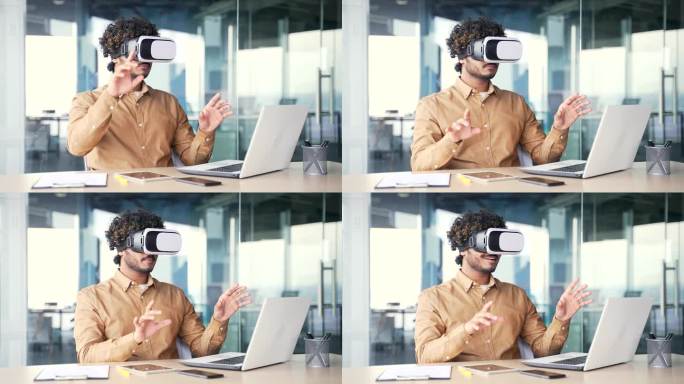 年轻成功的管理者坐在现代办公室的工作场所，在虚拟现实模拟器中使用VR眼镜工作