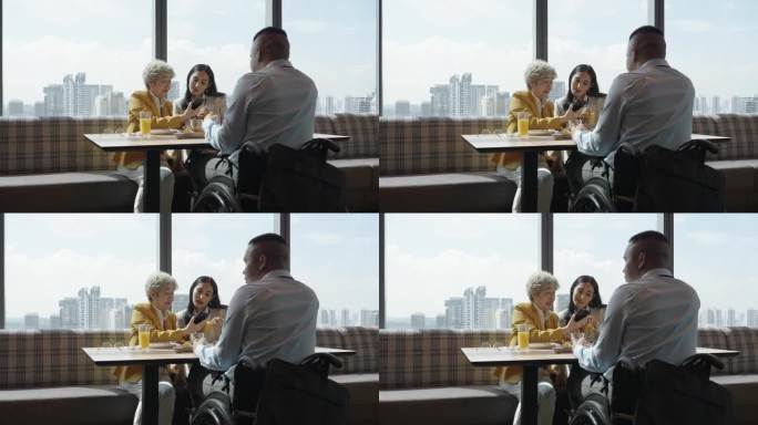 亚洲不同的商务人士在一家豪华酒店的餐厅共进午餐