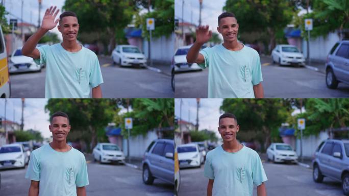 一个开朗的巴西年轻人在街上向邻居打招呼。快乐的南美人用手问候朋友