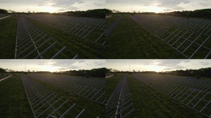 太阳能农场的全景，象征着向替代能源和可持续发展的转变。