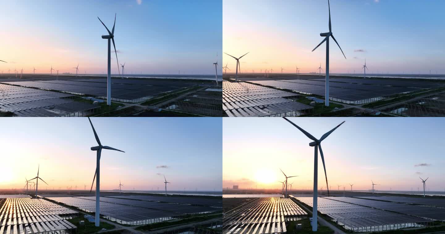 夕阳下太阳能光伏发电站风能发电场风车航拍