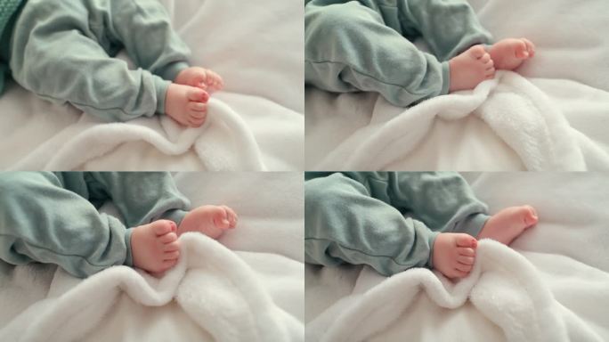 甜蜜，婴儿和婴儿的脚的特写躺在婴儿床上的毯子在他的托儿所在家里。一个刚出生的男孩在家里的卧室里放松时