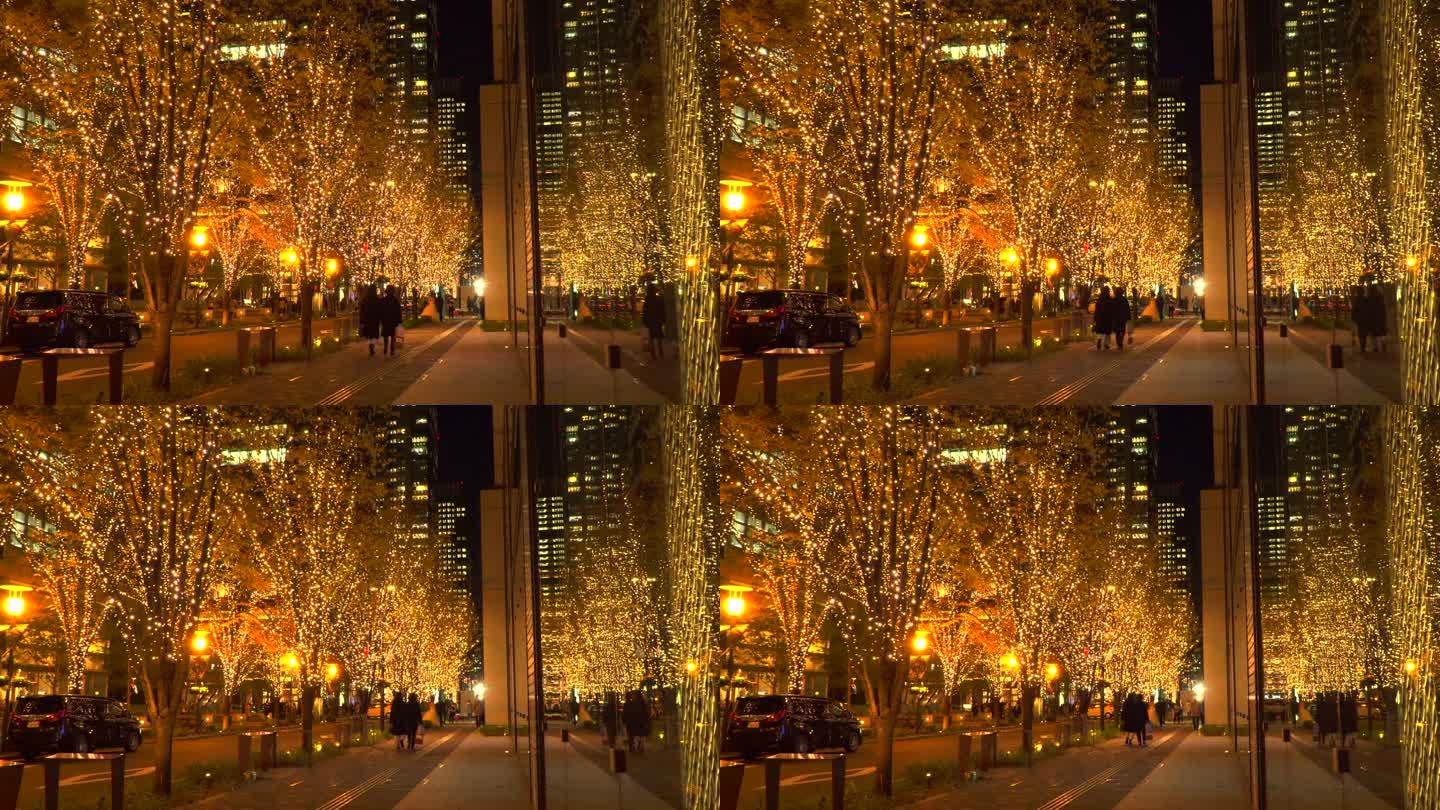 人们漫步在东京丸内的圣诞彩灯中