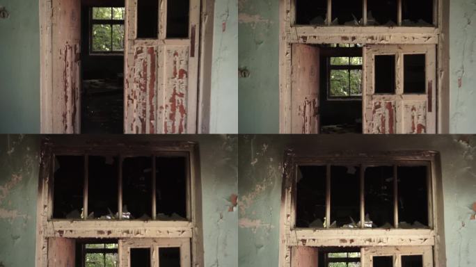 令人毛骨悚然和阴沉的废弃房子。门窗破碎，墙壁和地板被大火烧毁