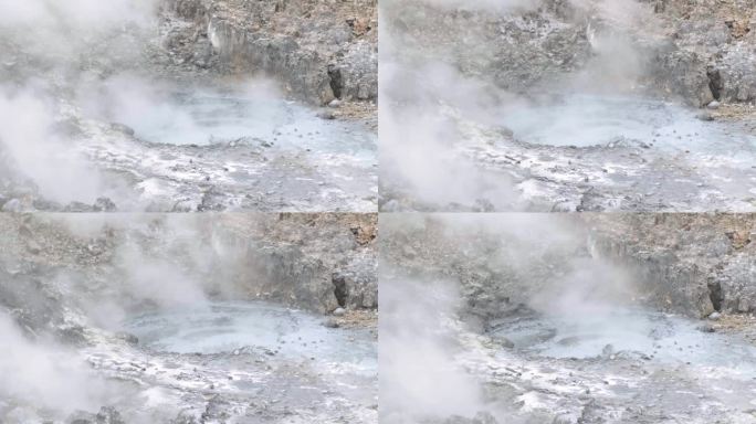 4K视频，火山口的沸水冒着热气