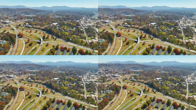 美国北卡罗莱纳州阿什维尔的高速公路交叉路口，秋天里汽车和卡车飞驰而过。从上面看美国的交通基础设施