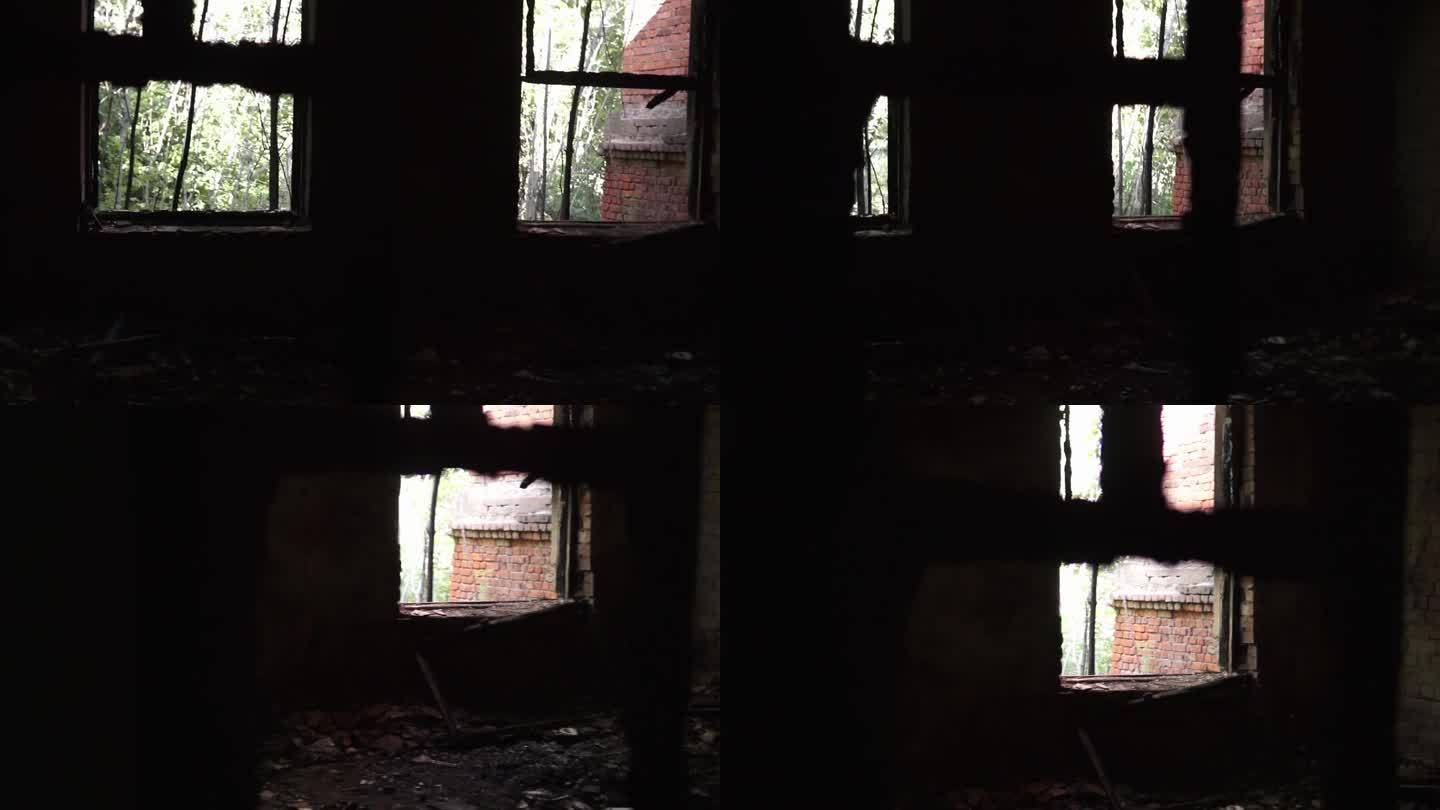 令人毛骨悚然和阴沉的废弃房子。门窗破碎，墙壁和地板被大火烧毁