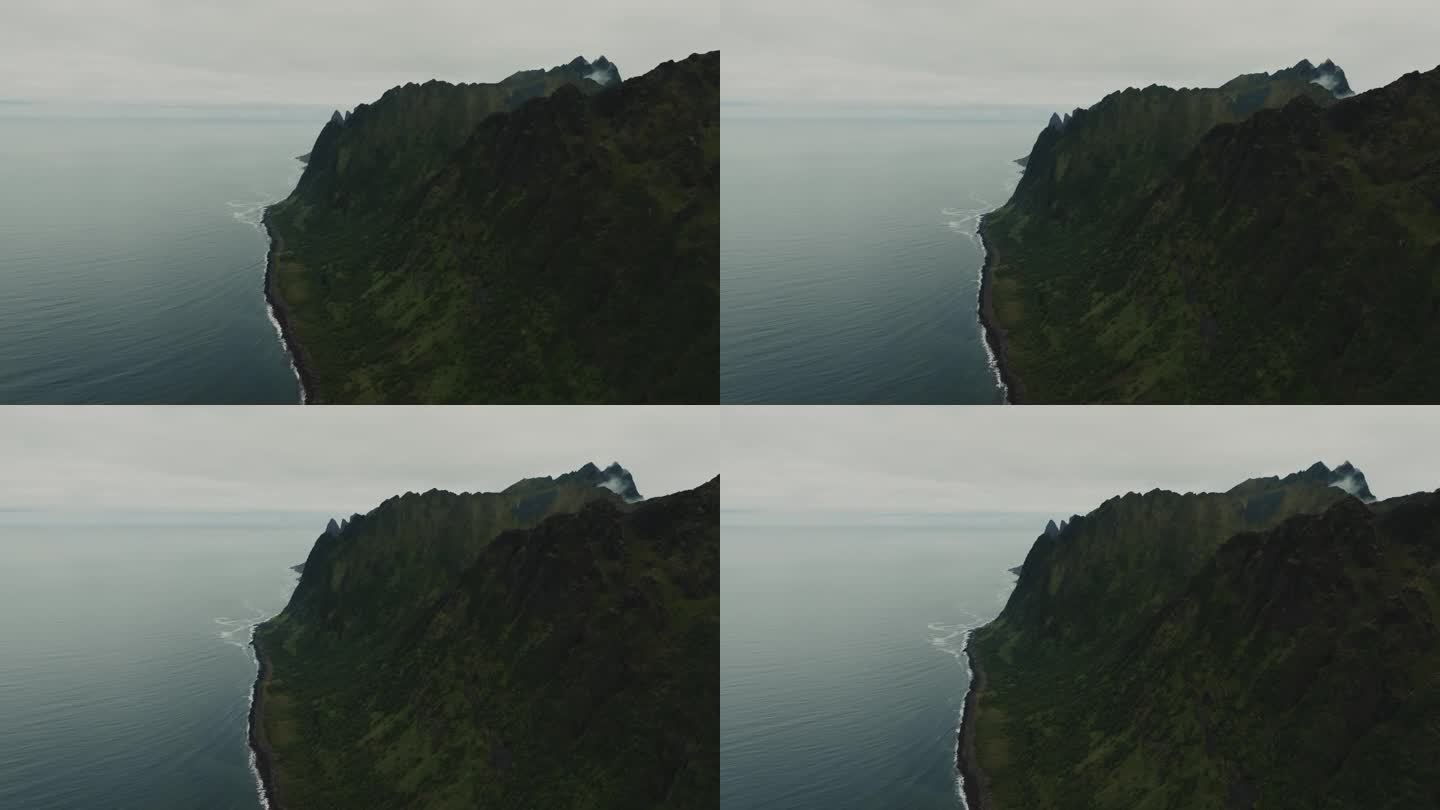 在挪威的Senja群岛上，无人机飞过挪威峡湾和挪威海的壮丽景色