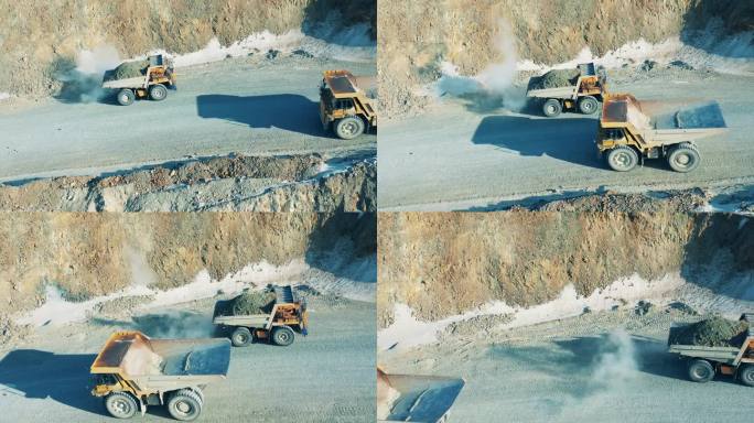 铜矿采石场路上有两辆卡车在行驶