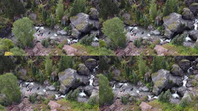 空中飞盘横跨河流，瀑布被巨石包围