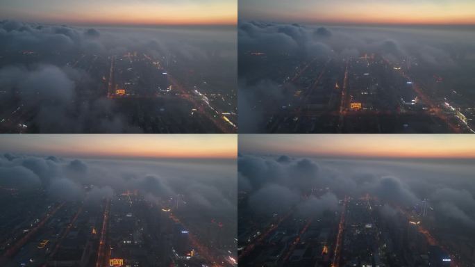 航拍傍晚时分云雾之下的威海市高新区城市