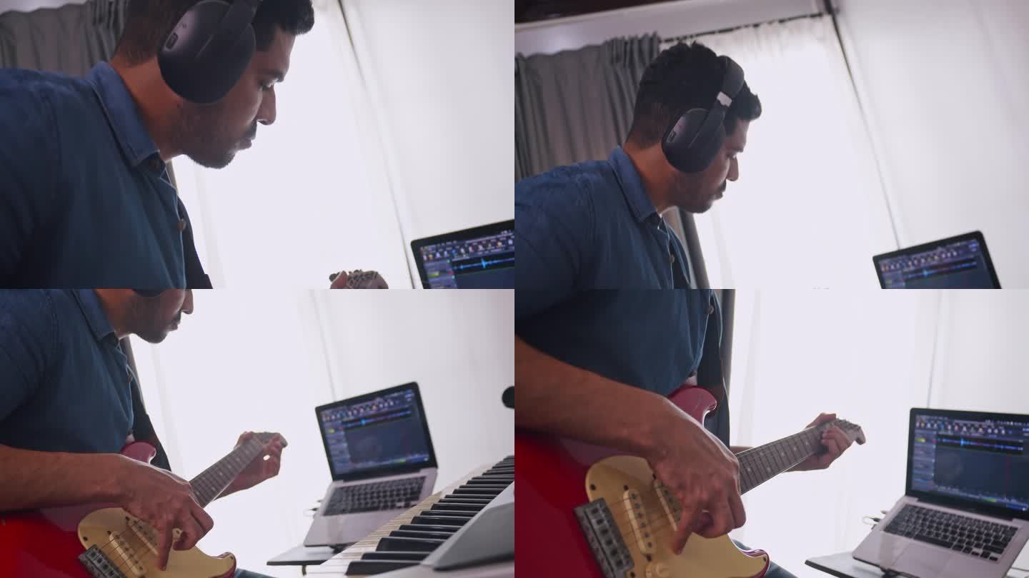 亚洲音乐家在家里的数码录音室录制电吉他。作曲家正在使用现代设备来创作旋律。