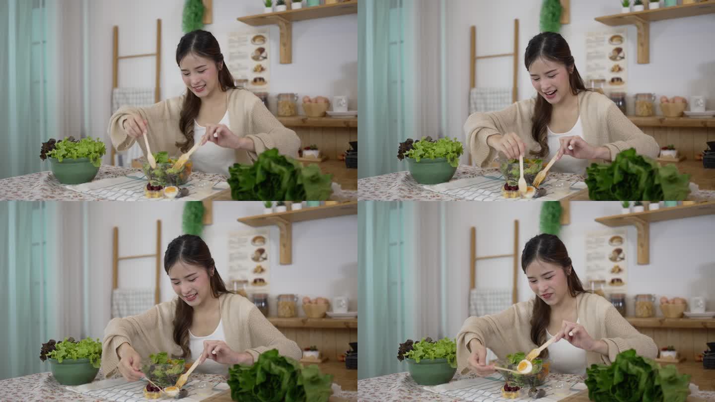 漂亮女人正在试吃沙拉。健康食品。