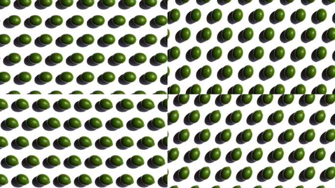 深绿色的柠檬在白色的背景上旋转，平移对称的图案