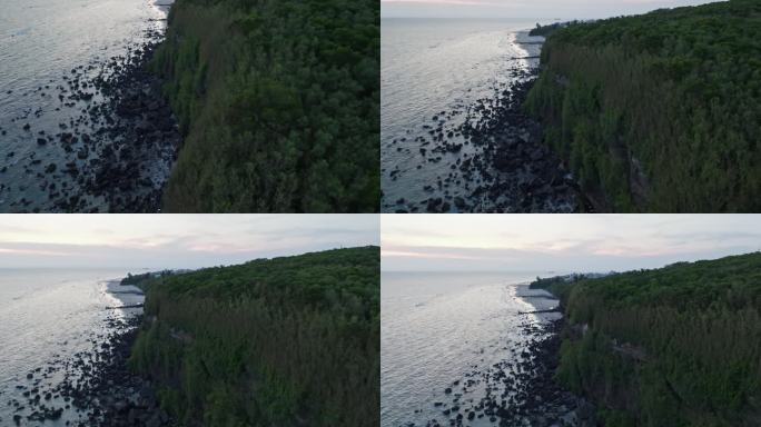 航拍傍晚的北海涠洲岛海边山崖美丽风景