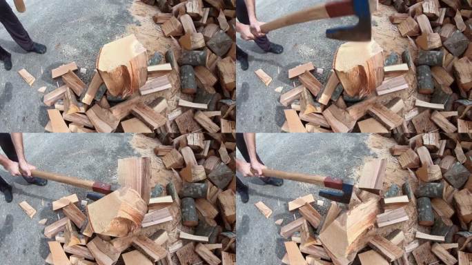 伐木工人在冬天砍柴，人们用斧头砍柴火。慢动作