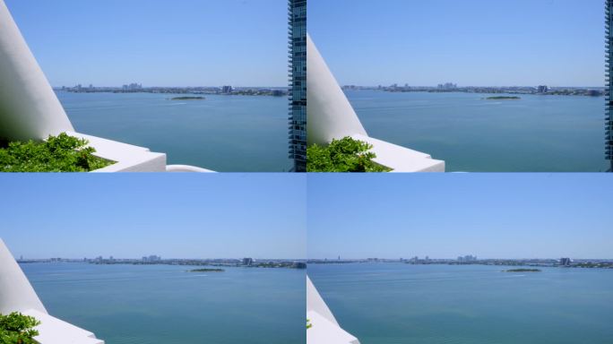 从南佛罗里达多层酒店建筑群的阳台上欣赏威尼斯群岛的美景。令人印象深刻的全景从豪华阁楼俯瞰迈阿密海滩