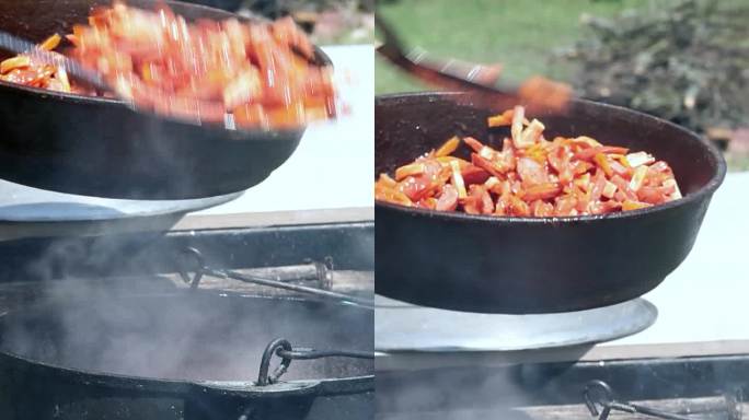 在明火上煮索扬卡汤。厨师把炒肉和蔬菜放进沸水里。垂直视频。