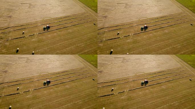 拖拉机在田间搬运秸秆，收割小麦后将干草收集成圆捆
