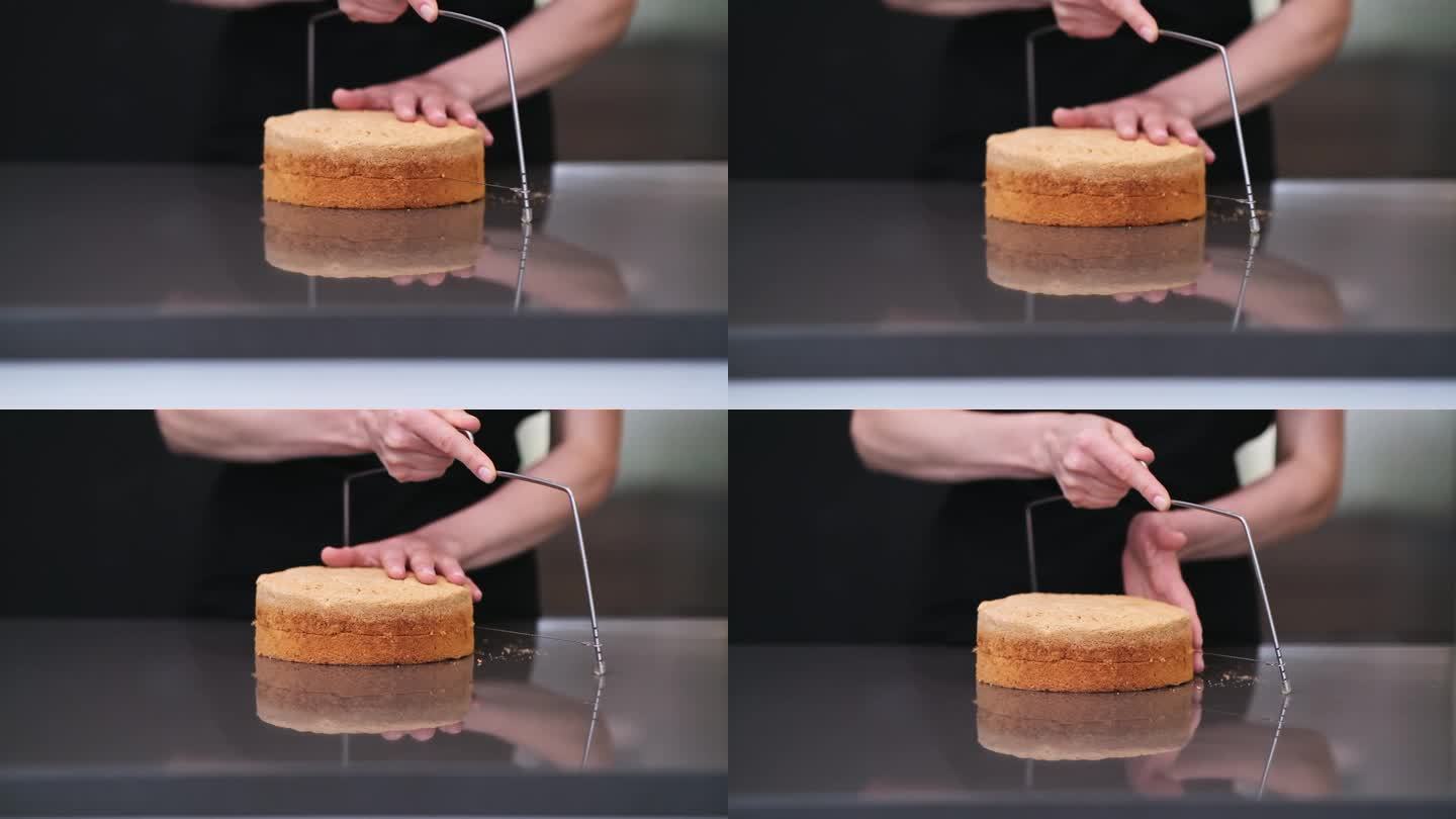 在现代厨房里，熟练的女人用菜刀把蛋糕层分开