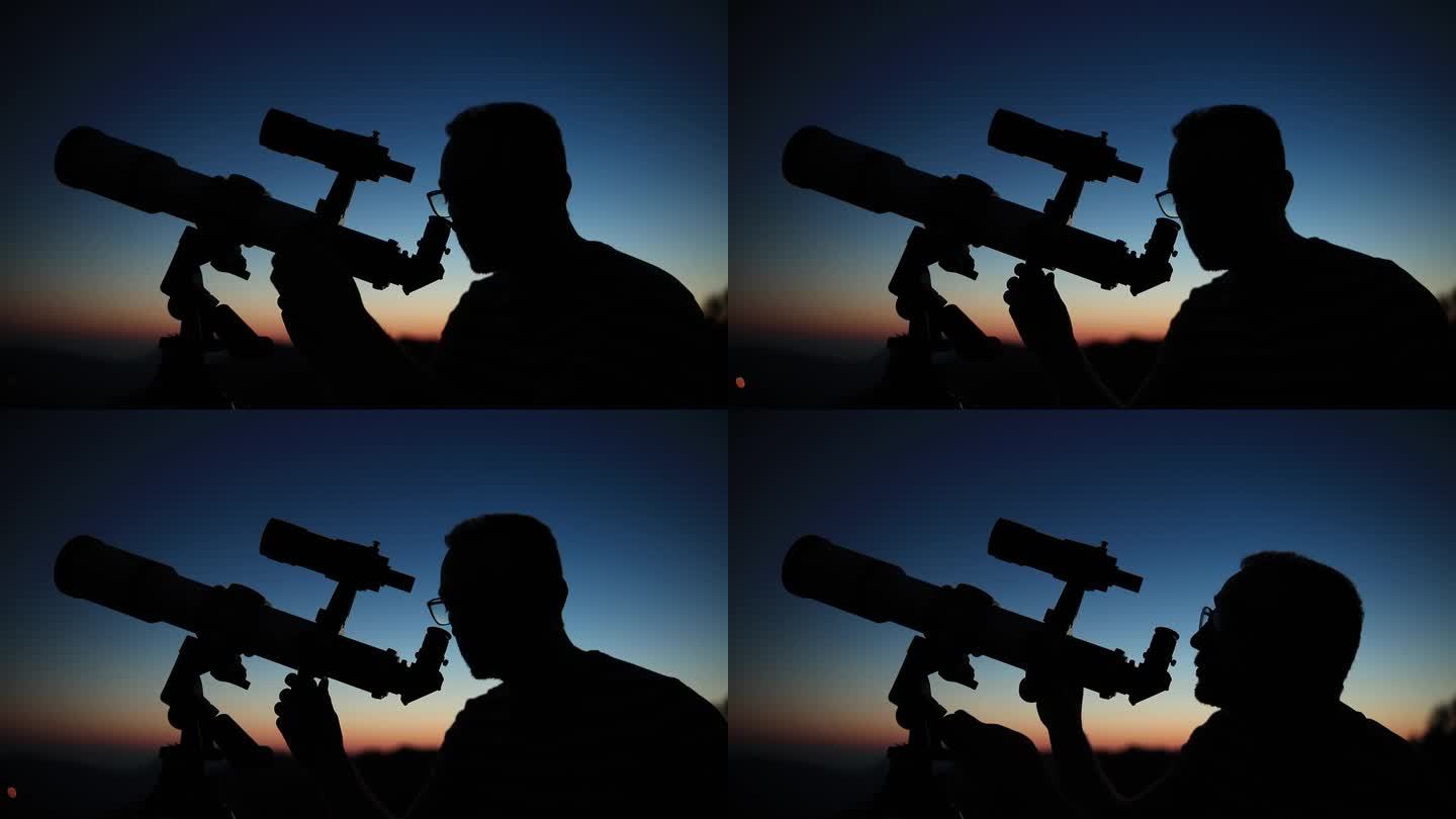 用望远镜观察星空和新月的天文学家。