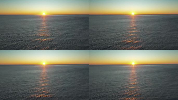 日出一天的开始，日出在水平线东海岸在晴朗的天空