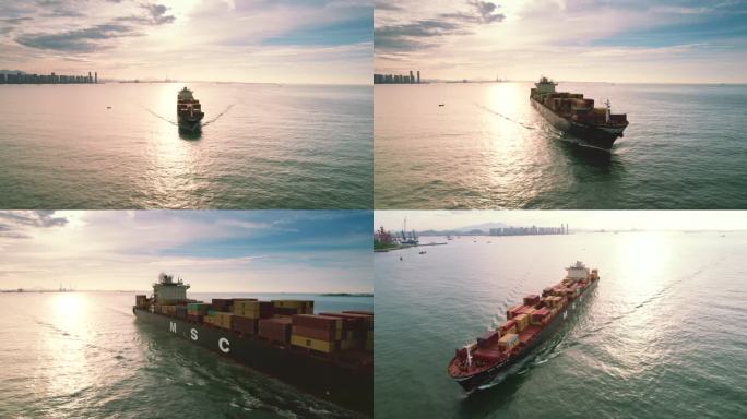 集装箱轮船海运货船行驶日出夕阳下