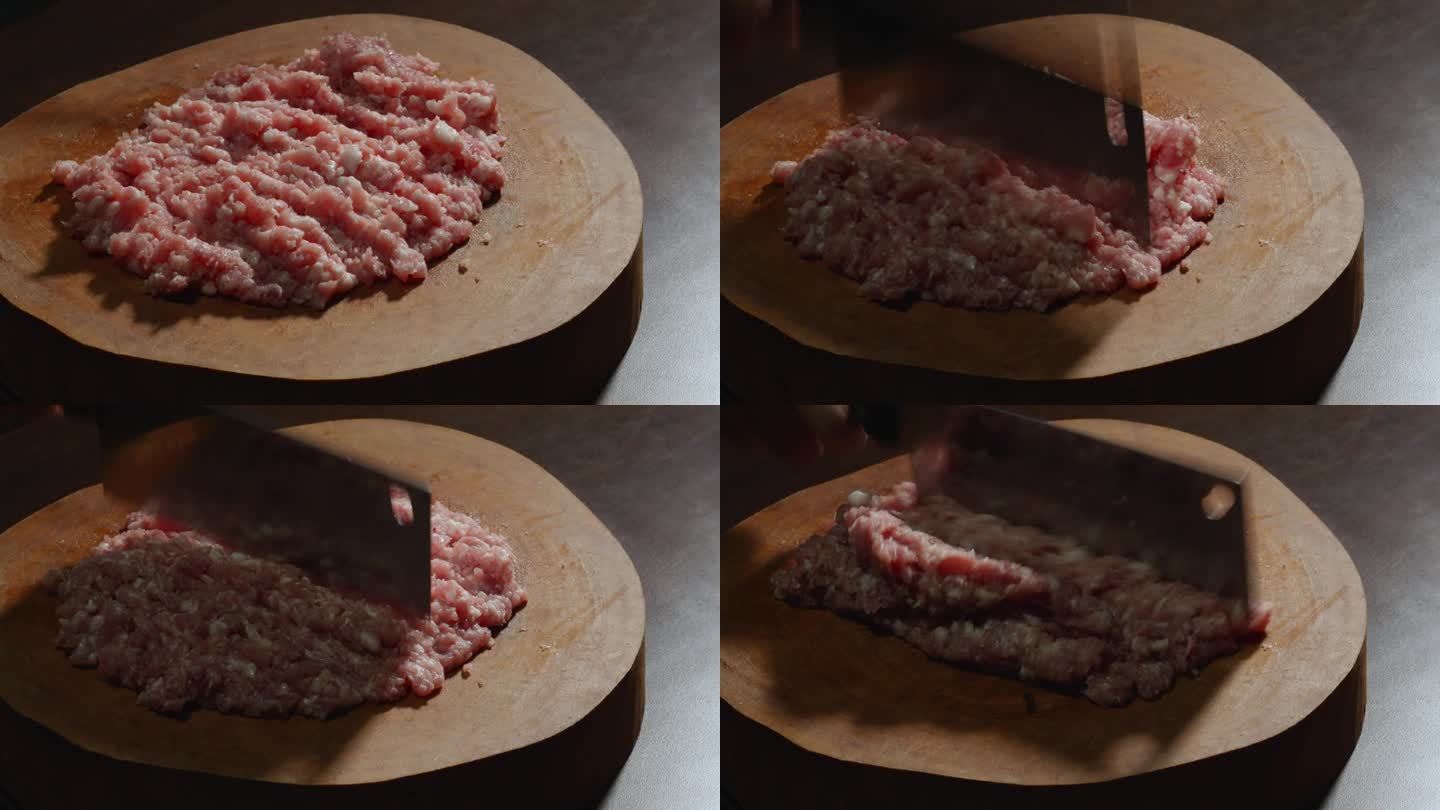 用切肉刀在木头砧板上剁碎猪肉