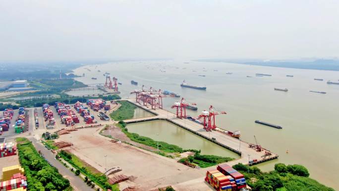 航拍长江物流码头港口集装箱装卸货物