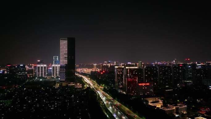 航拍杭州彩虹快速路与滨江城市夜景