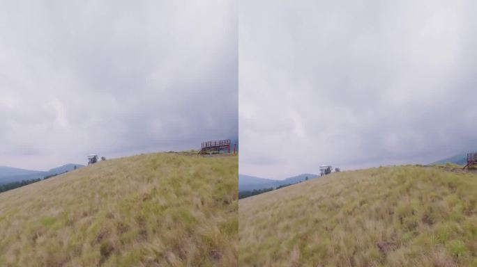 垂直视频。山近秋岭，观光观景塔丘陵